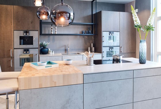 Uitgelicht! Designkeuken met betonlook en hout - next125